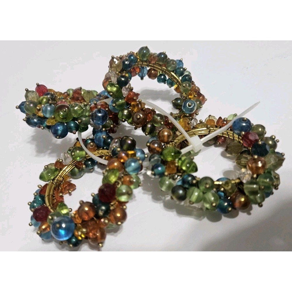 Set Of Four Vintage Pier One Multicolored Napkin Holder Or Drapery Holdback